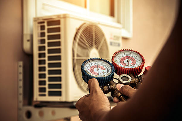 Professional Ductwork Repair technician working in Lenox, MO